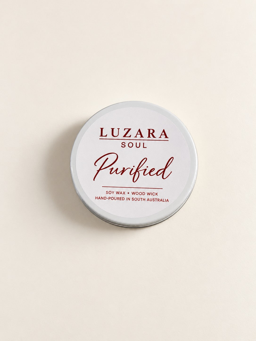 Purified 60g travel tin soy candle from the Luzara Soul Collection