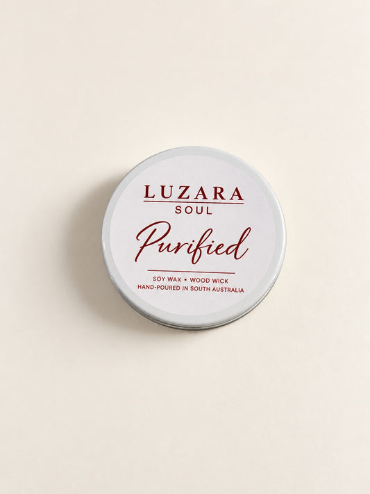 Purified 60g travel tin soy candle from the Luzara Soul Collection