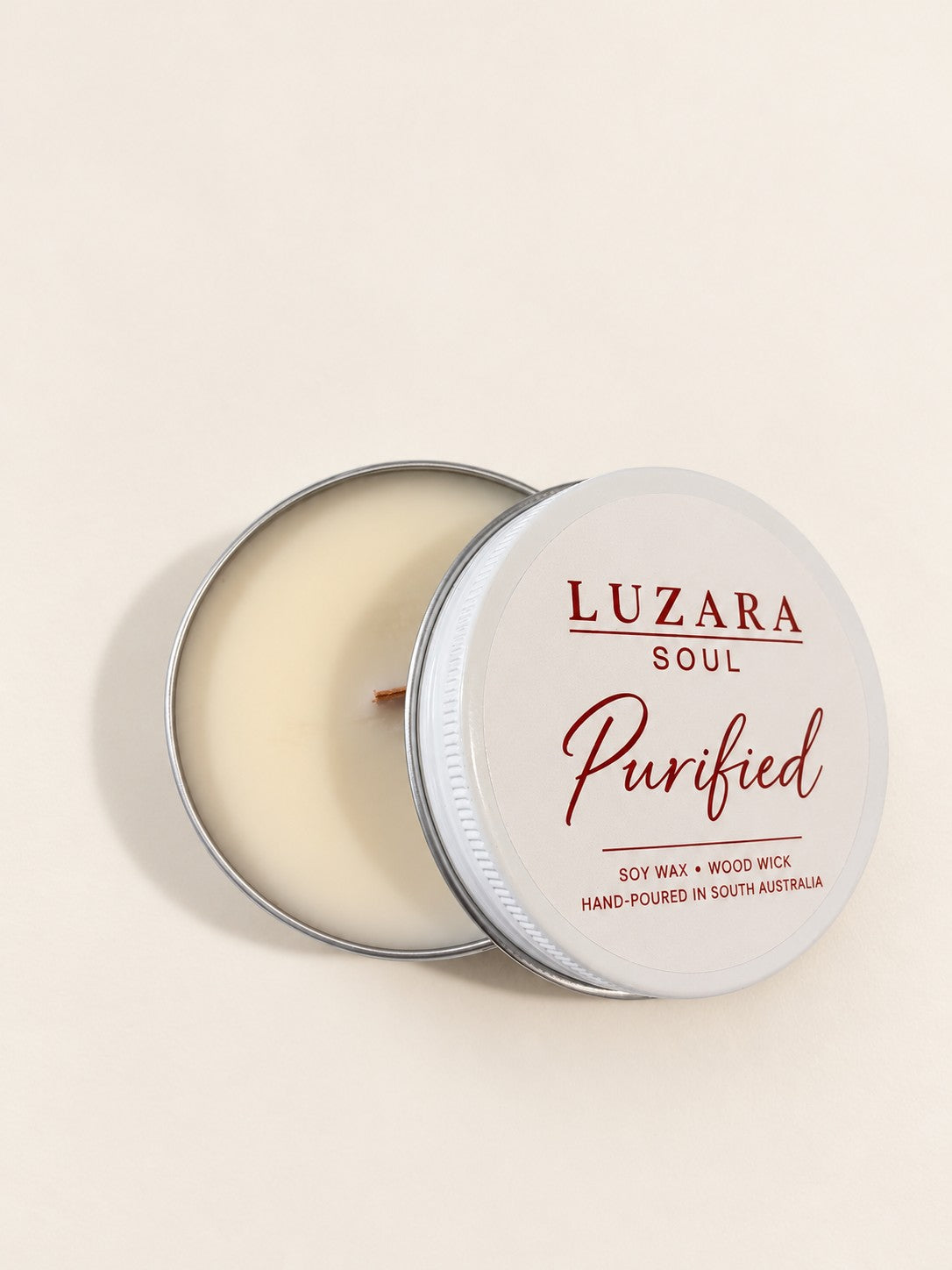 Purified 60g travel tin soy candle, lid open