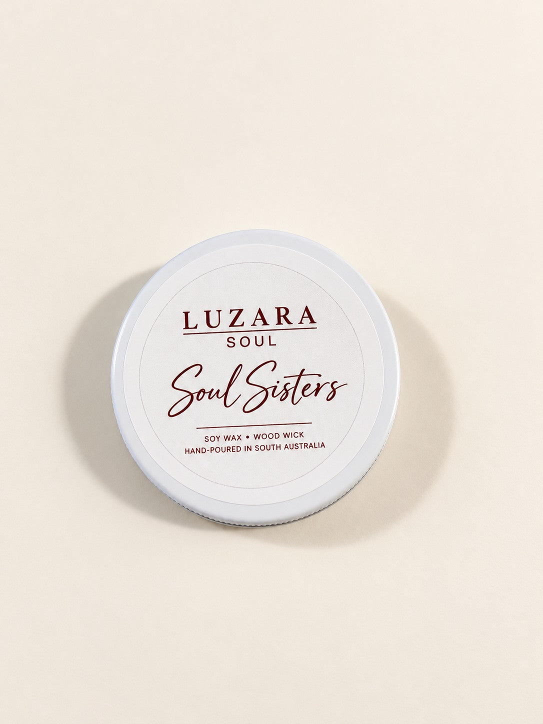 Soul Sisters 60g travel tin soy candle from the Luzara Soul Collection