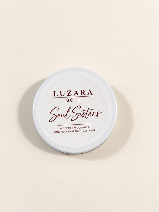 Soul Sisters 60g travel tin soy candle from the Luzara Soul Collection