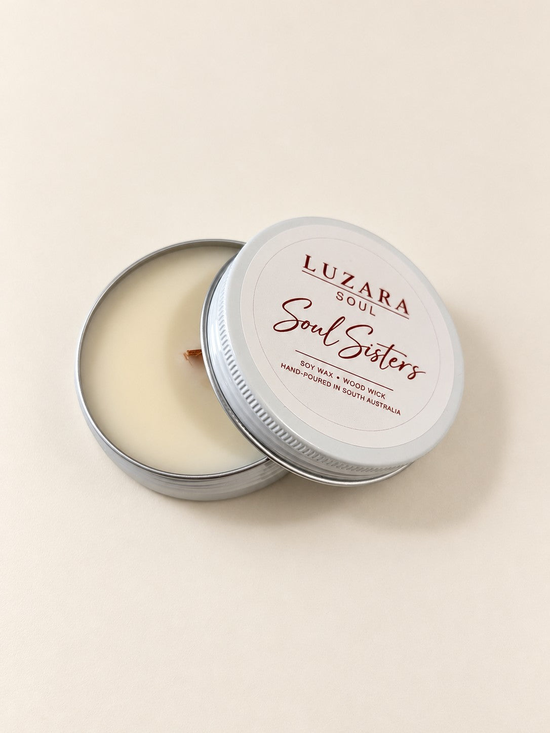 Soul Sisters 60g travel tin soy candle, lid open